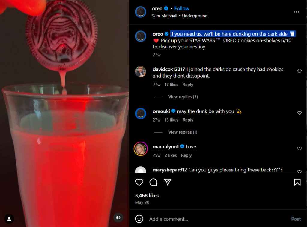 An Instagram reel of a Darth Vader shaped Oreo cookie being dunked in mil with a light saber in the background